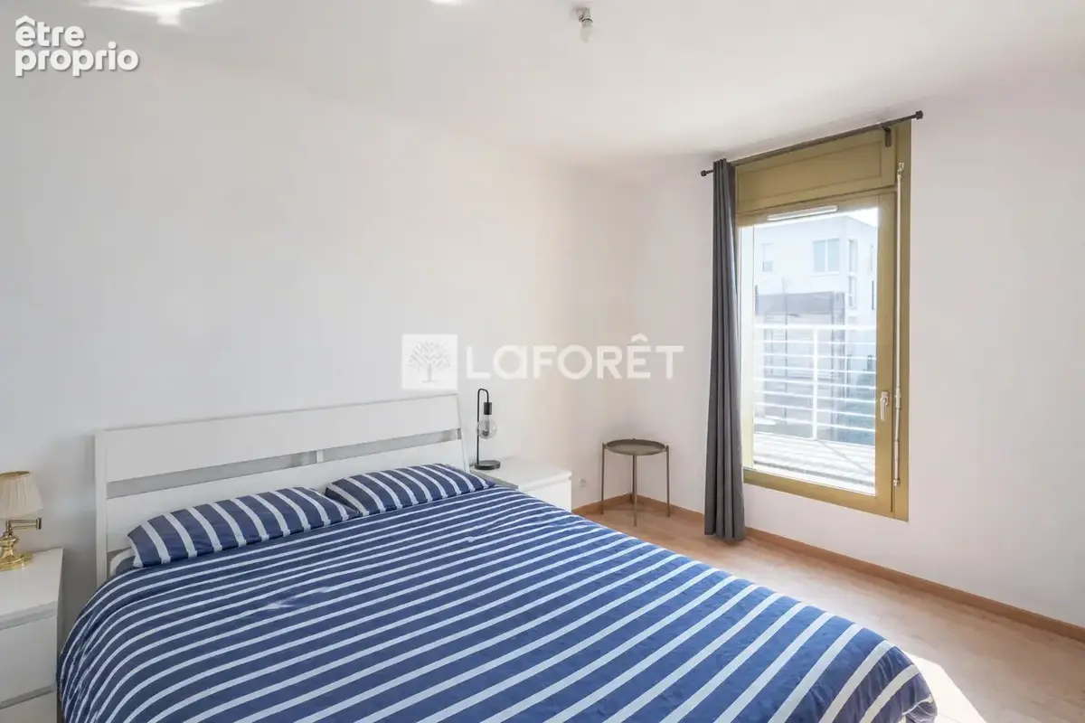 Duplex familial de 93 m² avec terrasse de 22 m², 2 stationnements et cave - photo 4