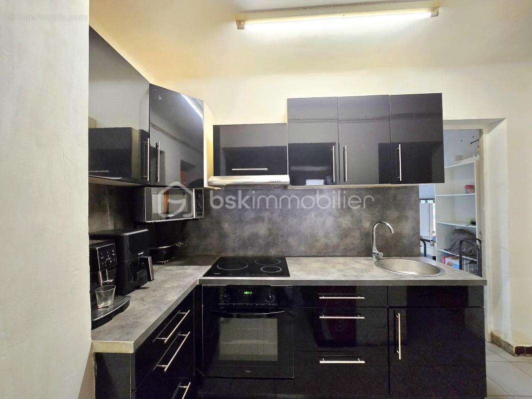 En exclusivite - rez-de-chaussee- centre-ville - photo 4