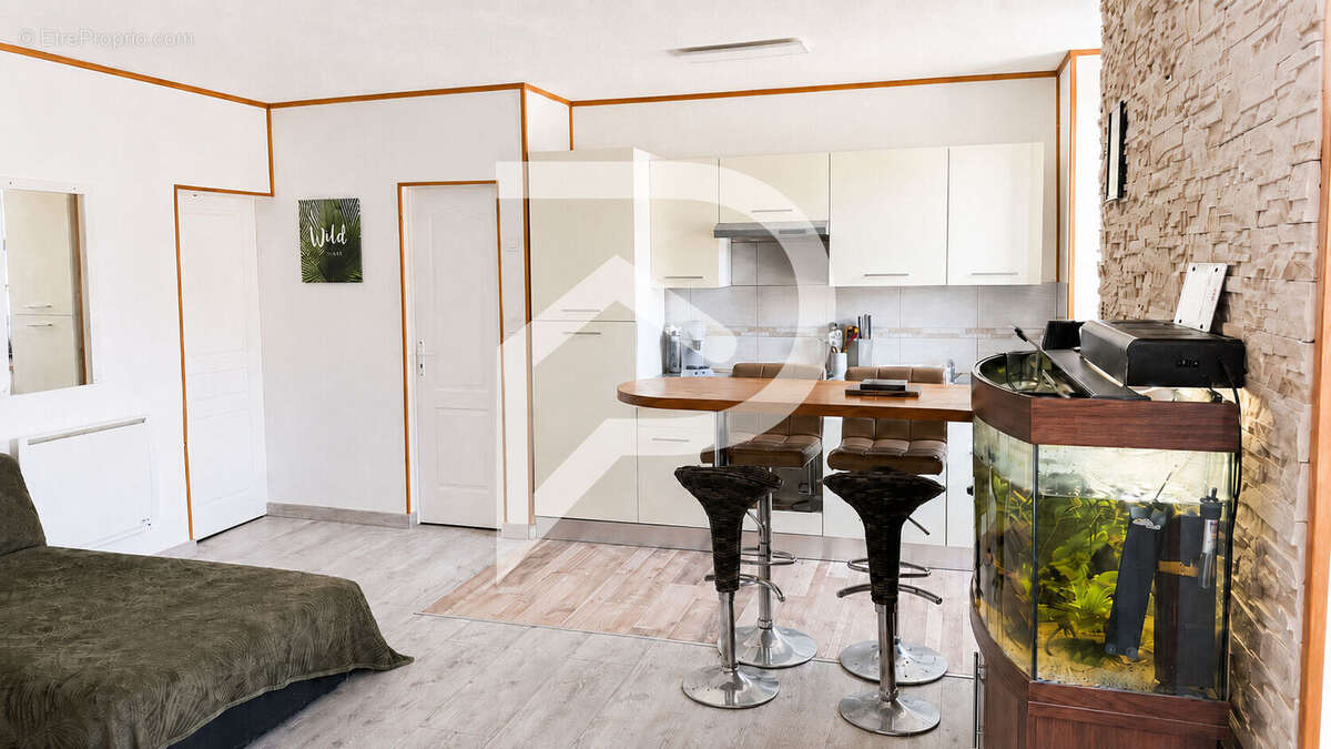 Appartement T2 rénové de 45 m² vendu loué Montredon-Labessonnié - photo 3