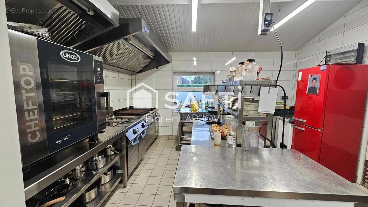 Photo 1 - Commerce à BUYSSCHEURE