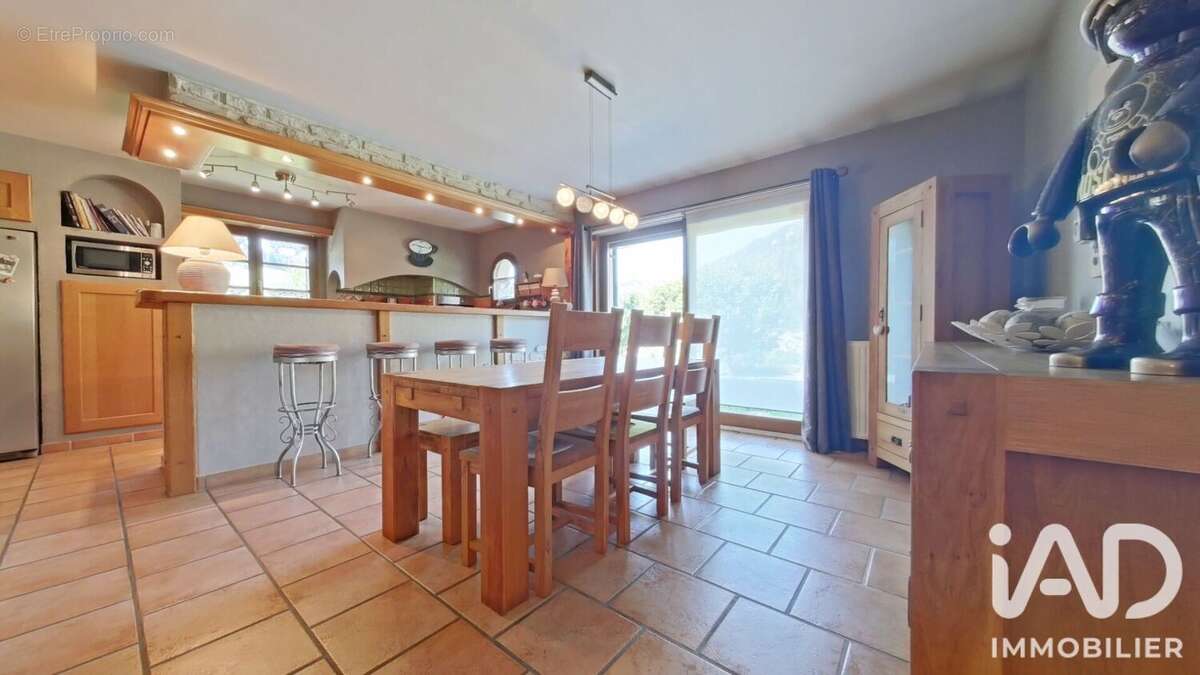 Maison 113 m² à Premanon  - photo 9