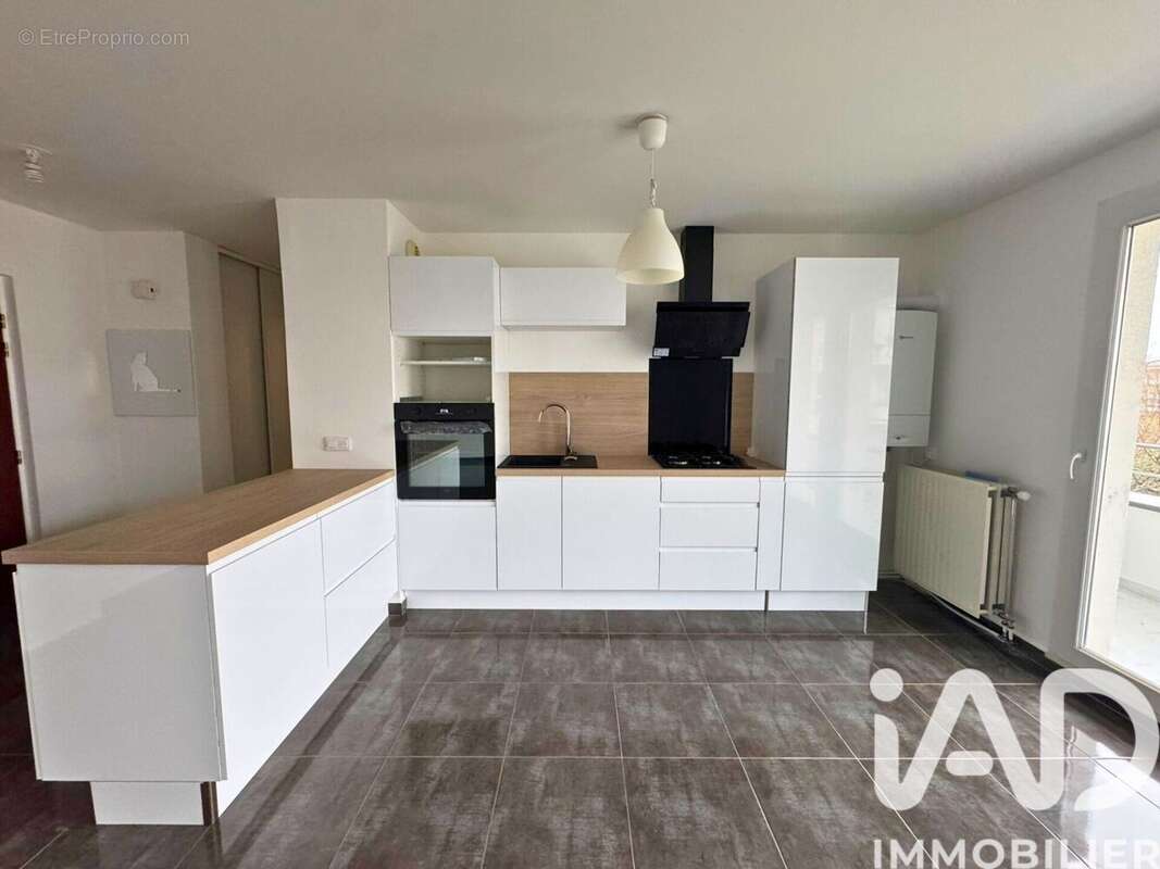 Photo 2 - Appartement à SAINTE-GENEVIEVE-DES-BOIS