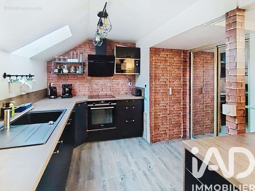 Photo 2 - Appartement à MONTIGNY-LE-BRETONNEUX