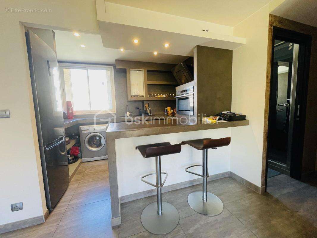 Appartement T2 rénové, résidence sécurisée, quartier en plein essor - photo 5
