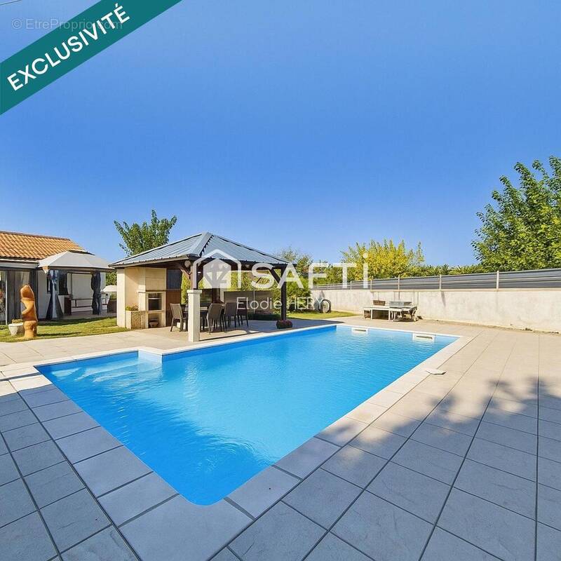 Photo 1 - Maison à LE TAILLAN-MEDOC