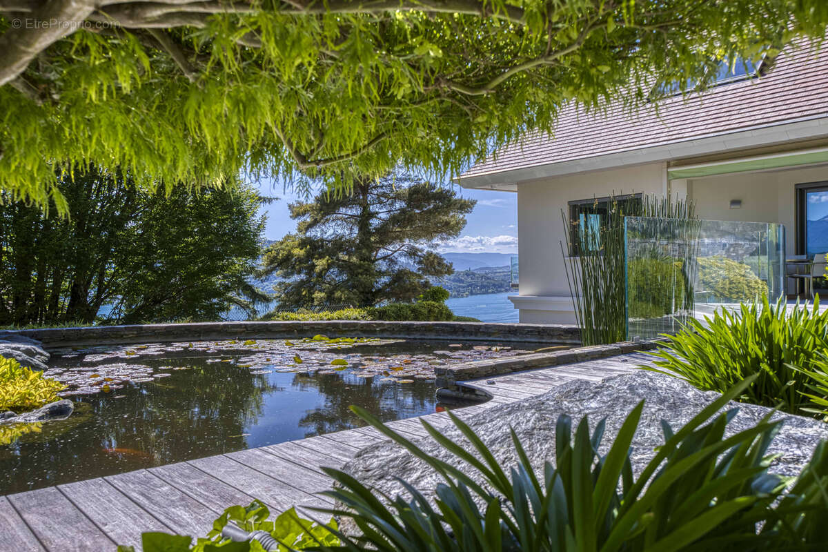 Villa d'exception dominant le lac - photo 76