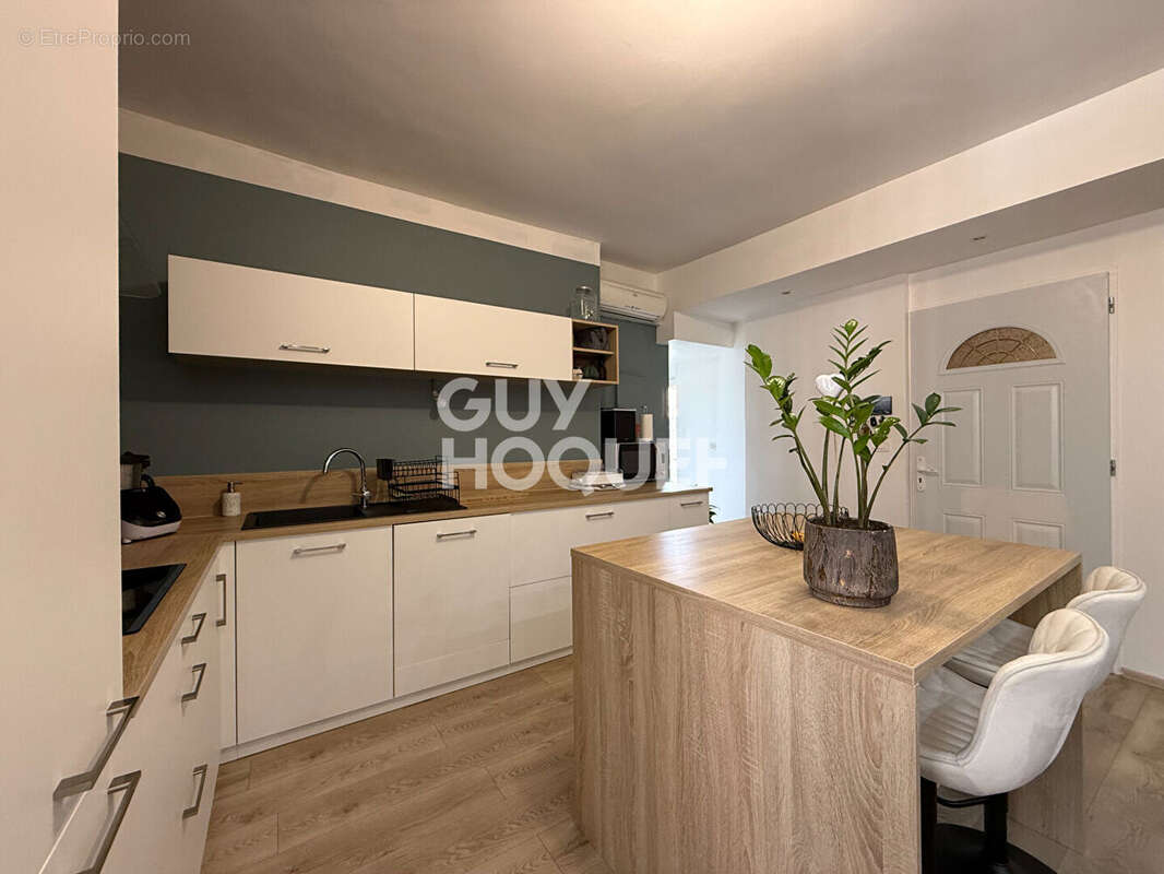 Appartement T2 Bis possibilité T3 au centre  d'Echalas de 73.27 m2 - photo 7