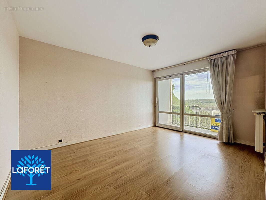 Appartement Evry-Courcouronnes 3 pièces 60m² + 2 boxes + cave - photo 3