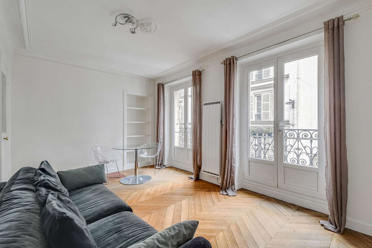 Appartement Paris 2 pièce(s) 42 m2 - photo 2