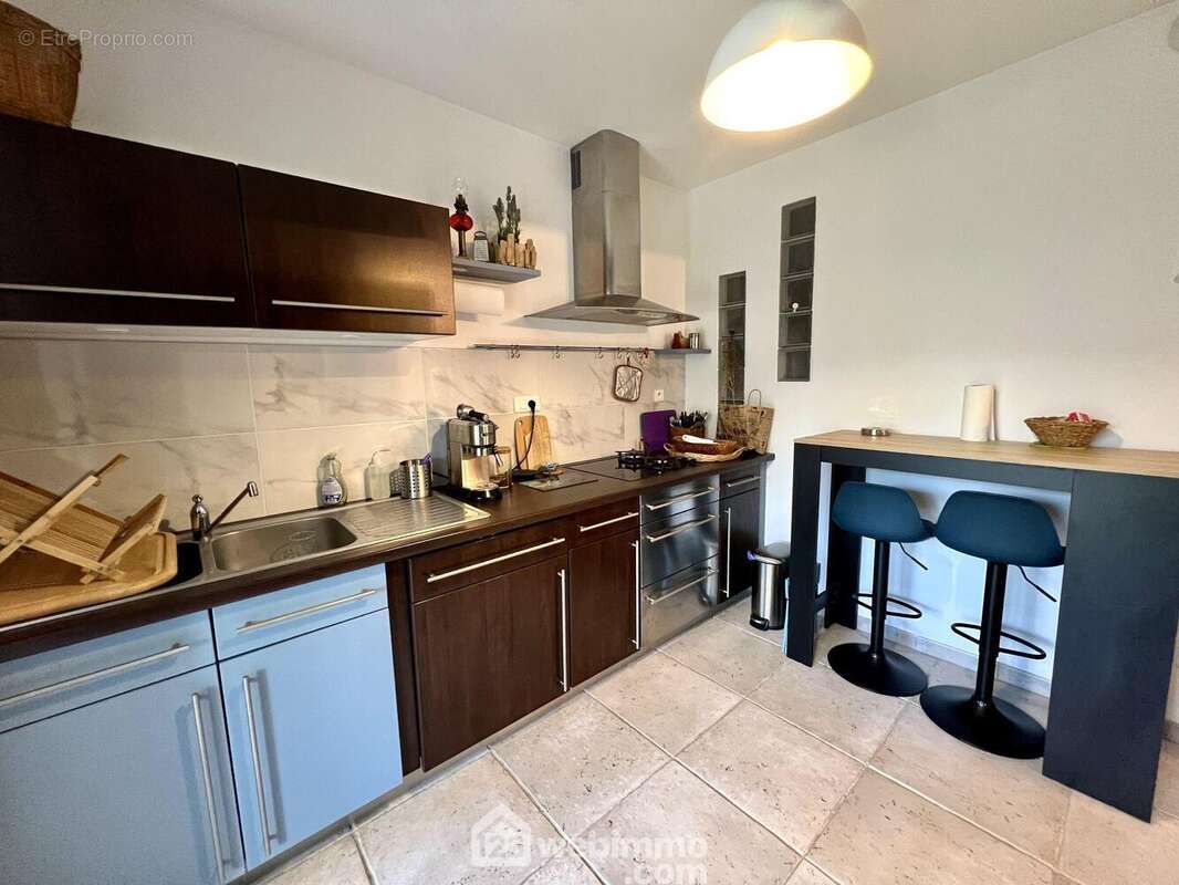 La cuisine séparée est entièrement aménagée et équipée... - Appartement à BIGUGLIA