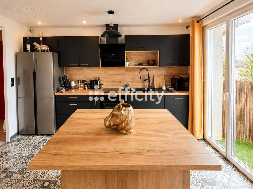 Appartement à CHENOVE