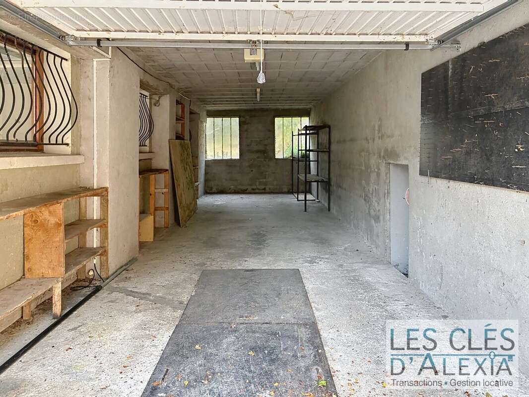 Maison deux appartements- Terrain- deux garages- Veranda - photo 7