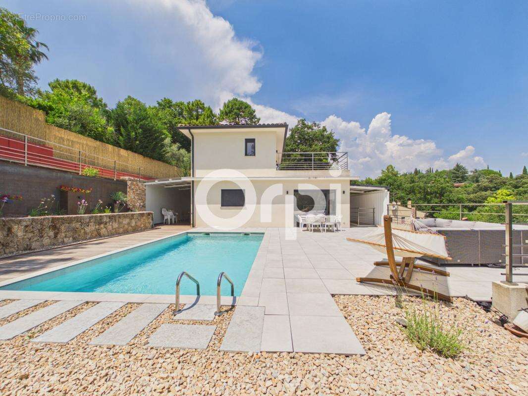 Maison moderne -piscine -vue dégagée - double garage - proche commodités - photo 5