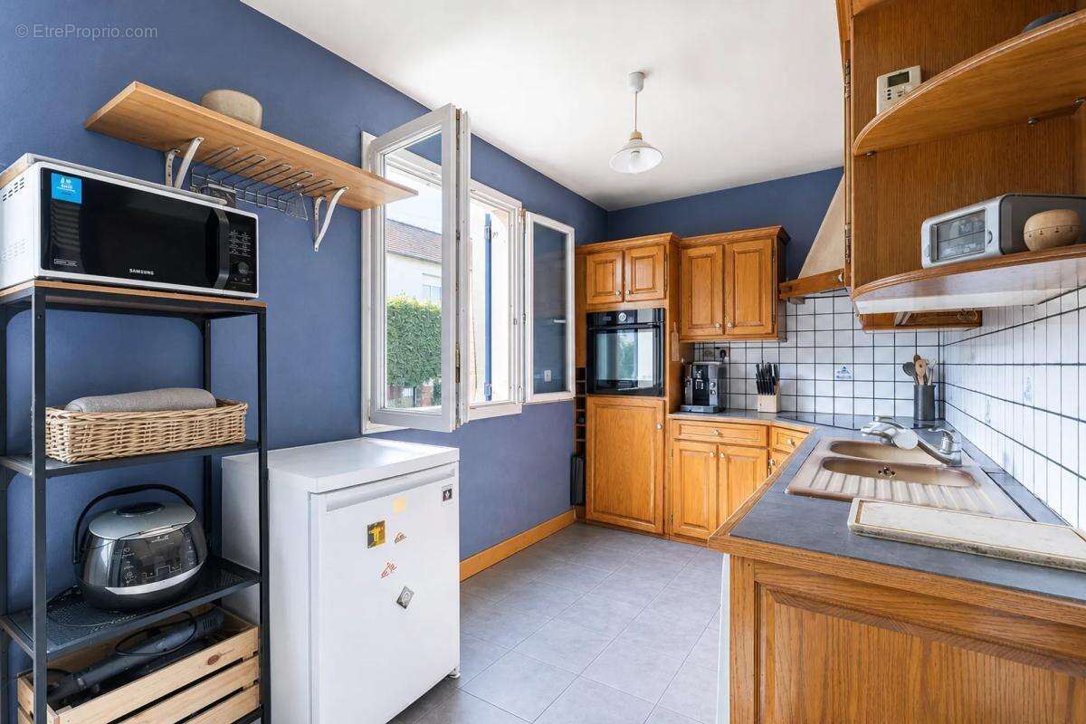 Maison de 6 pièces de 122 m² à Savigny-sur-Orge - photo 7