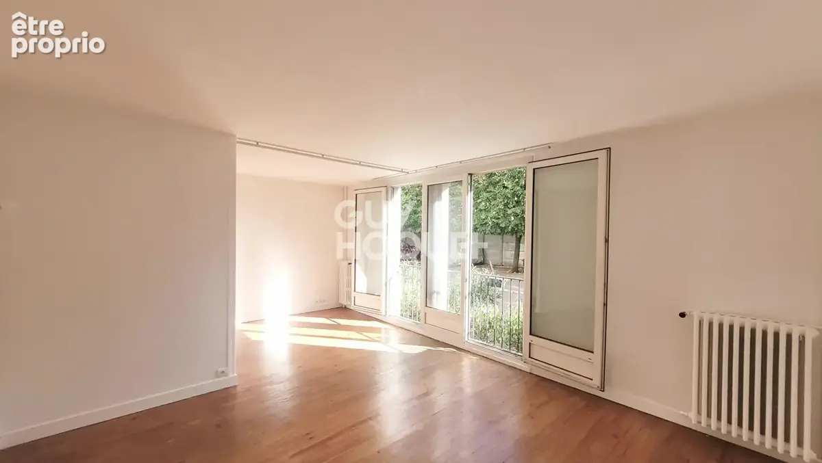 Asnieres 3 p. 52.42 m2 - parking et cave - photo 1