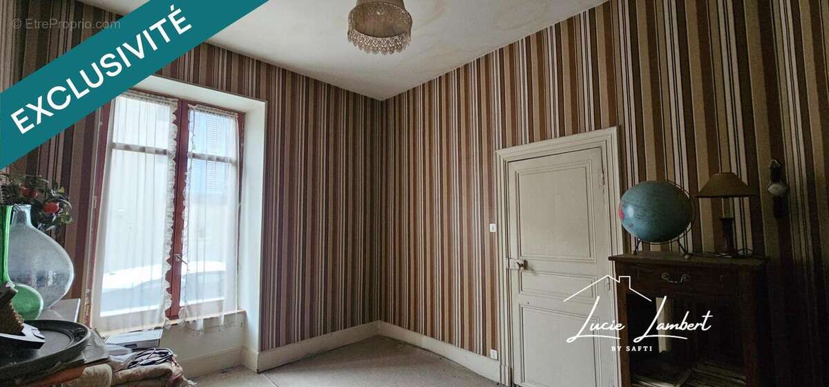 Photo 8 - Maison à LE BREUIL-SUR-COUZE