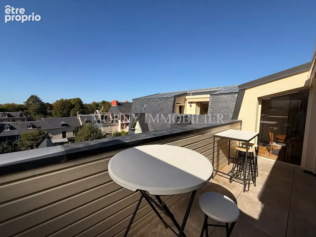 Appartement dernier étage avec deux terrasses - parking privatif et cave - photo 2
