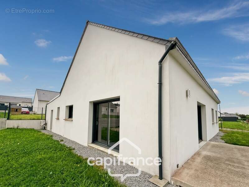 Maison à REGUINY