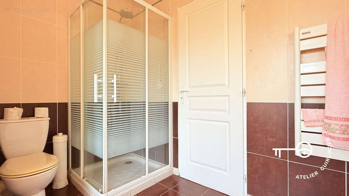 Le confort d'un pavillon moderne dans un cadre verdoyant et paisible - photo 10