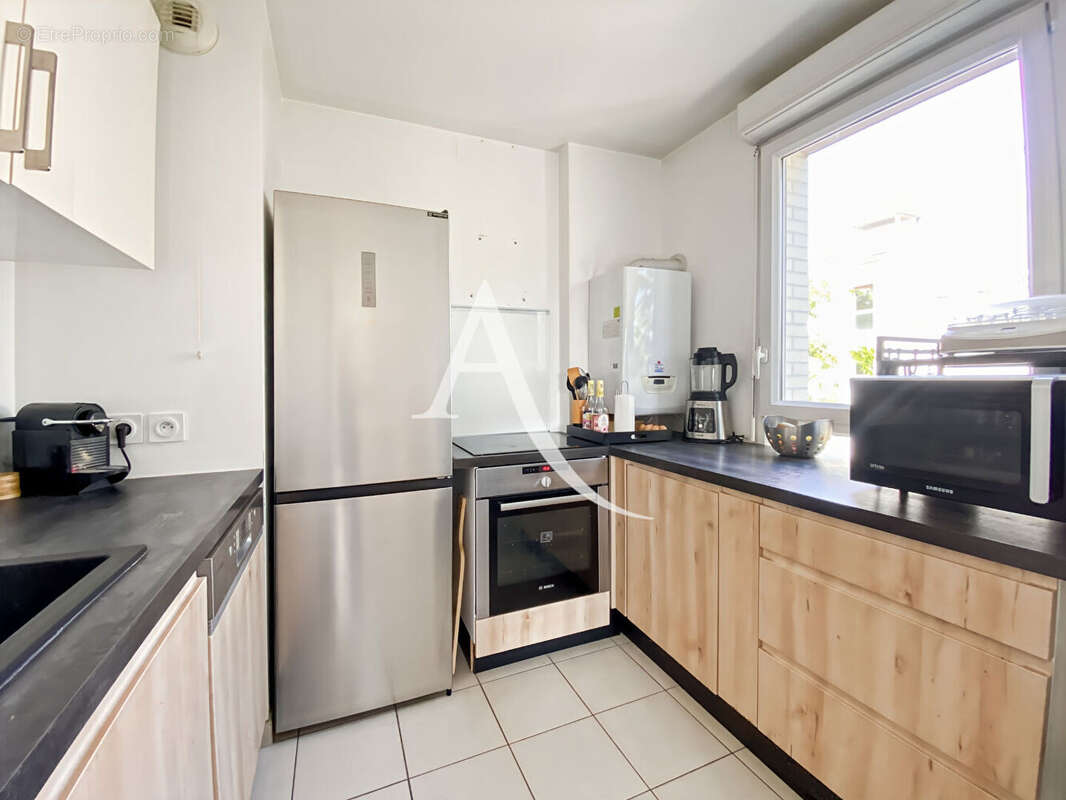 Appartement Bois D Arcy 3 pièce(s) 65.21 m2 - photo 5