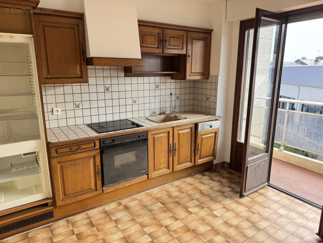 Appartement type 3 avec balcons cave parking intérieur - photo 2
