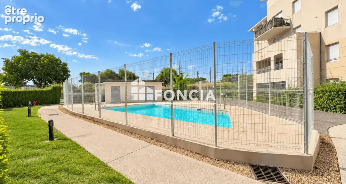 Appartement proche du centre-ville, environ 85 m², résidence avec piscine sécurisée - photo 1