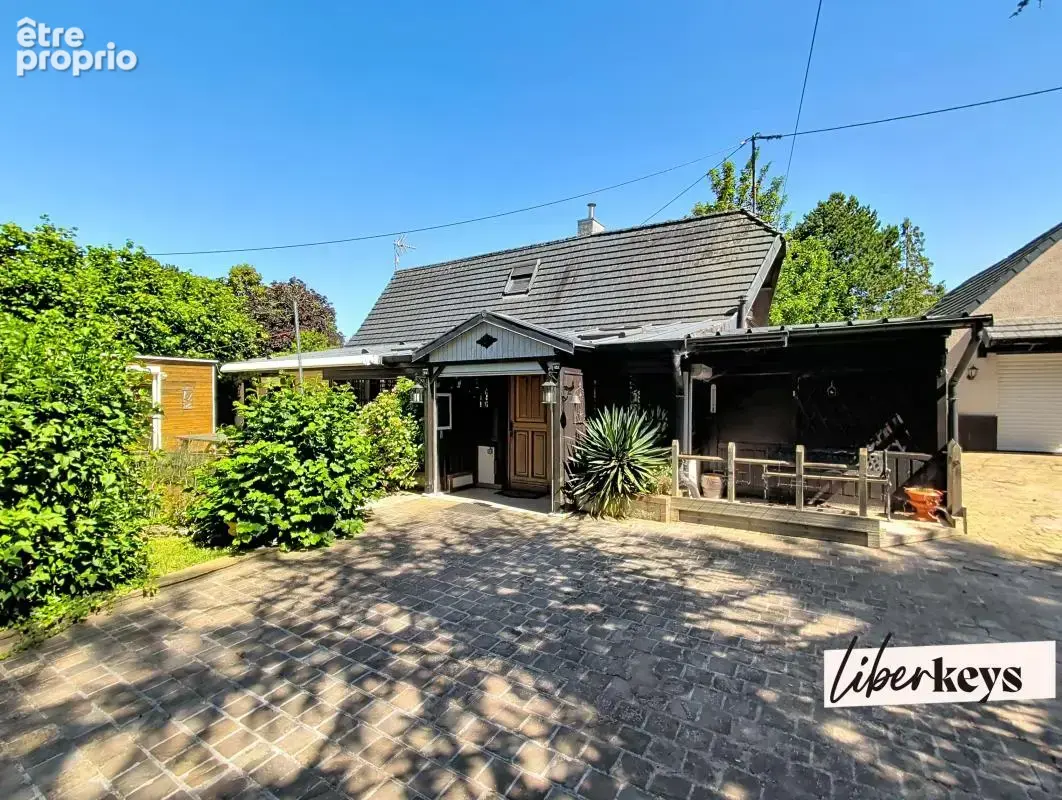Maison de campagne située à BOURTH, 3 chambres, nombreux garages et remises sur terrain de 1024m2 clos et paysagé - photo 2