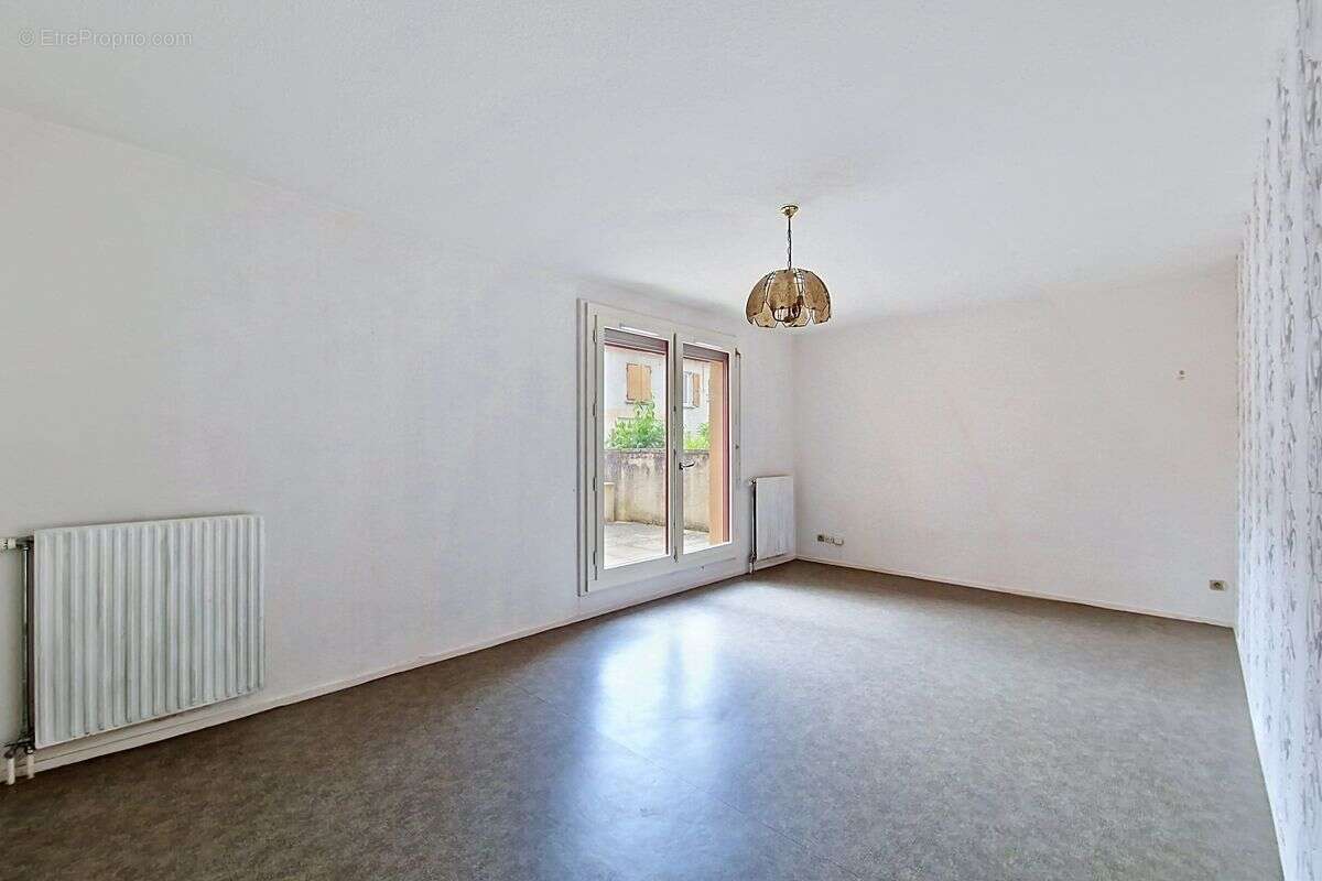 Appartement T2 en rez de jardin - photo 4
