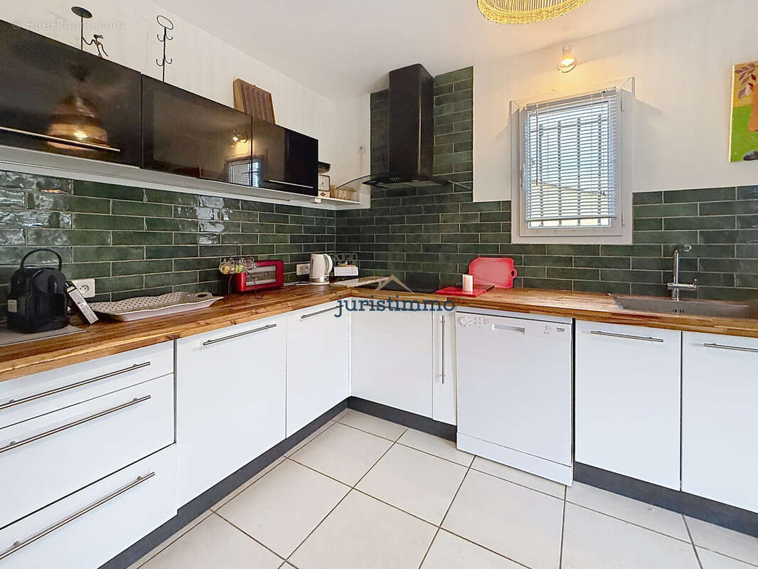 A 1,5 kms du centre ville-maison de plain-pied-3 chambres-piscine-520 m2 de terrain - photo 5