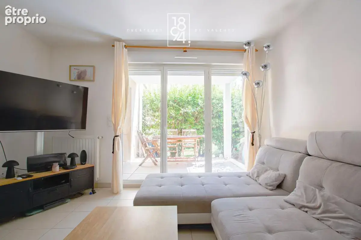 Appartement T2 en rez de jardin , parking double et cave - photo 5