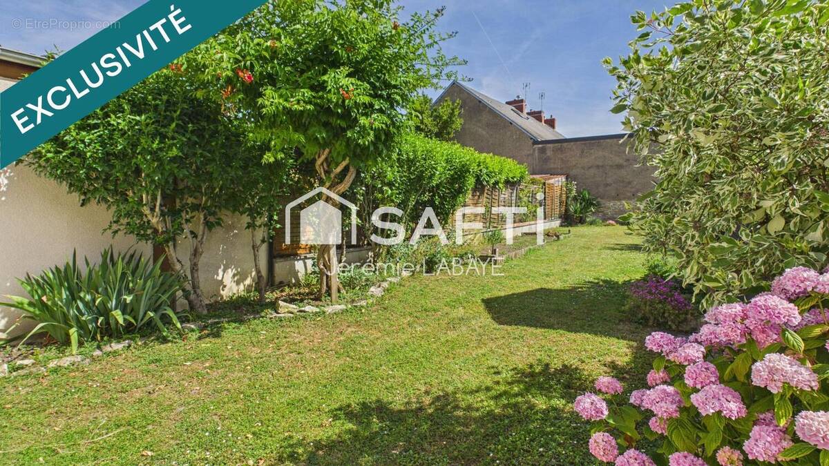 Photo 1 - Maison à CHATEAUROUX