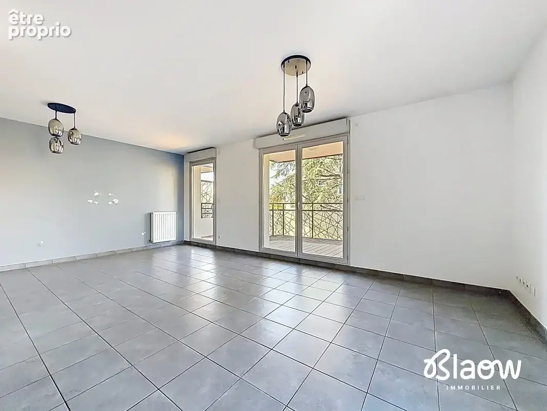 Appartement 4 pièces 88 m² à vendre à Decines-Charpieu (69150) - photo 2