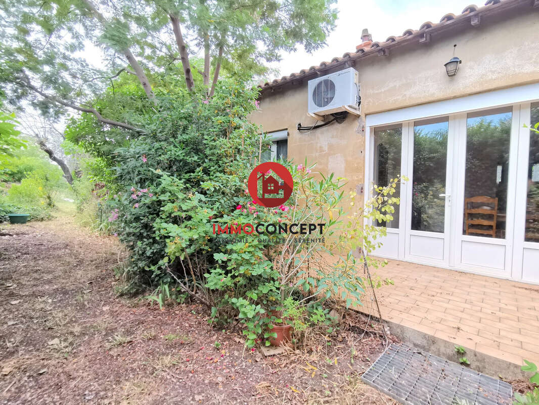 Maison à LAUDUN-L&#039;ARDOISE