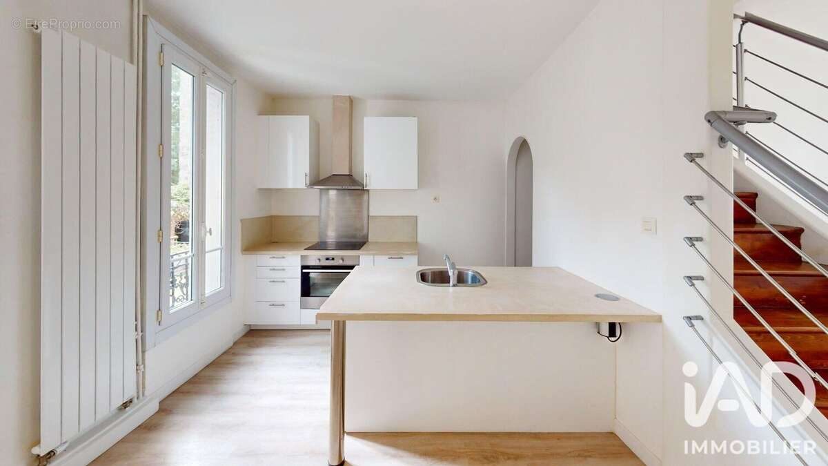 Photo 4 - Maison à COURBEVOIE