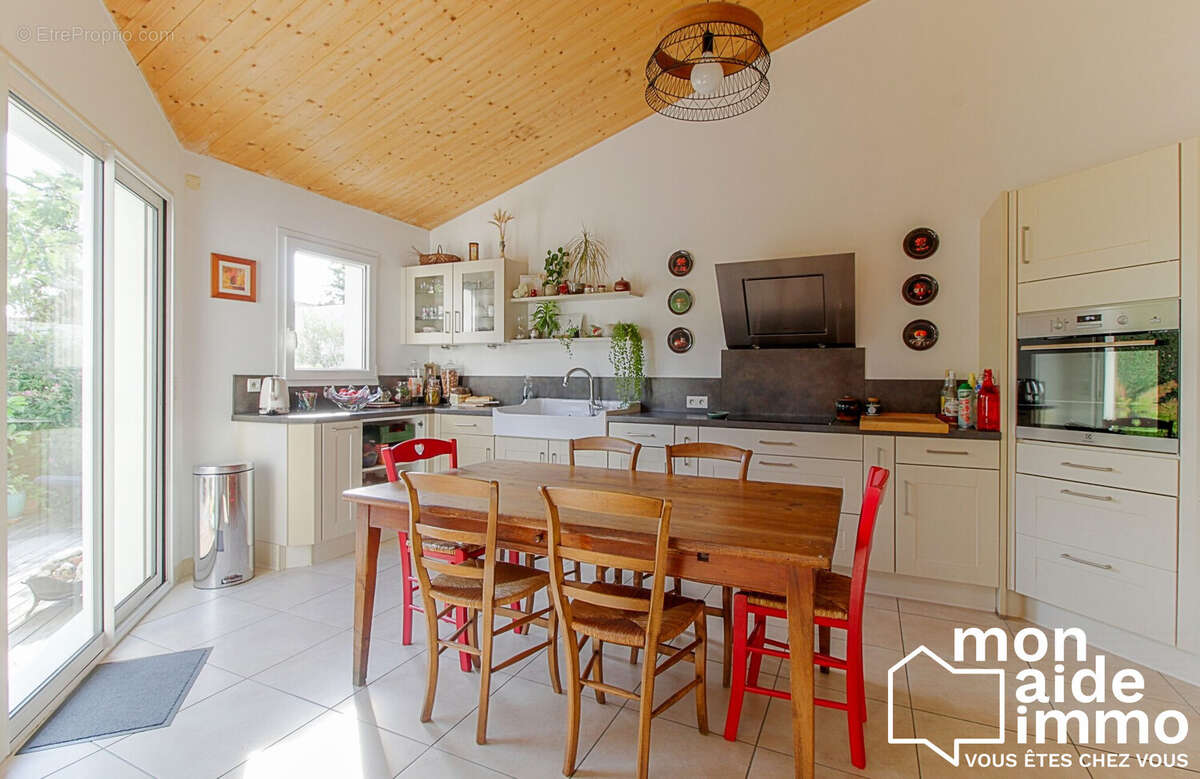 Maison 128 m² à Puilboreau  - photo 2