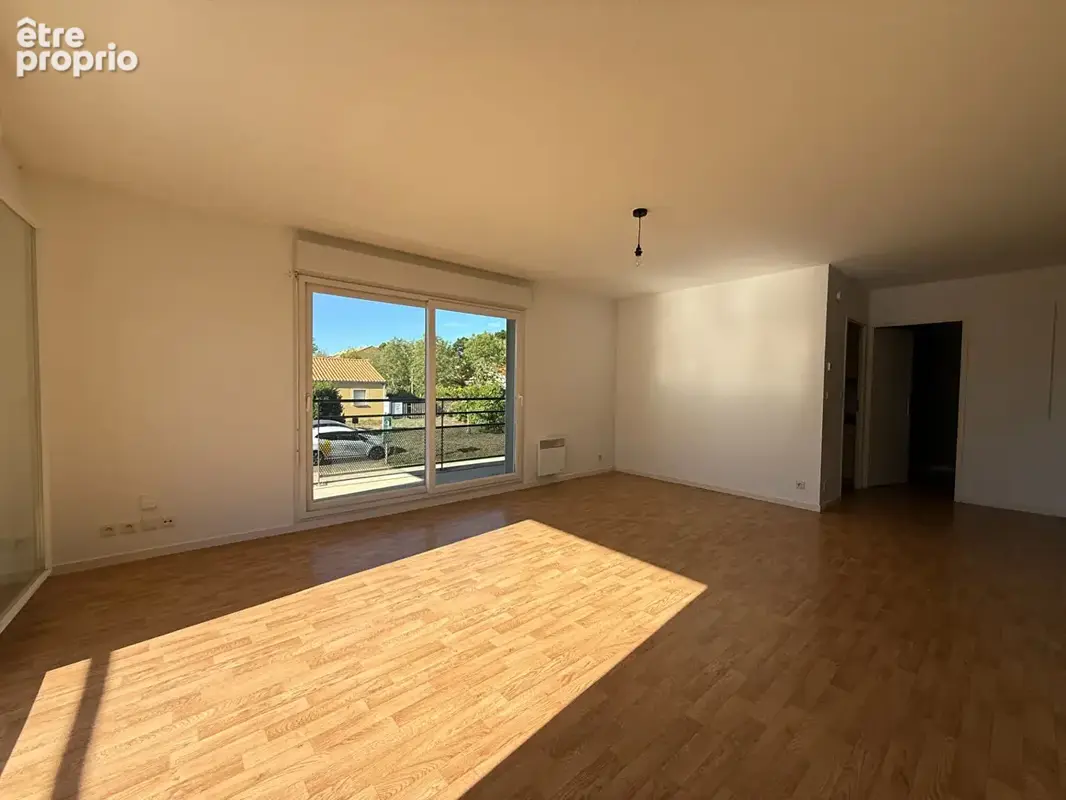 Appartement T4 de 83 m² avec balcon, garage double et cave - photo 6