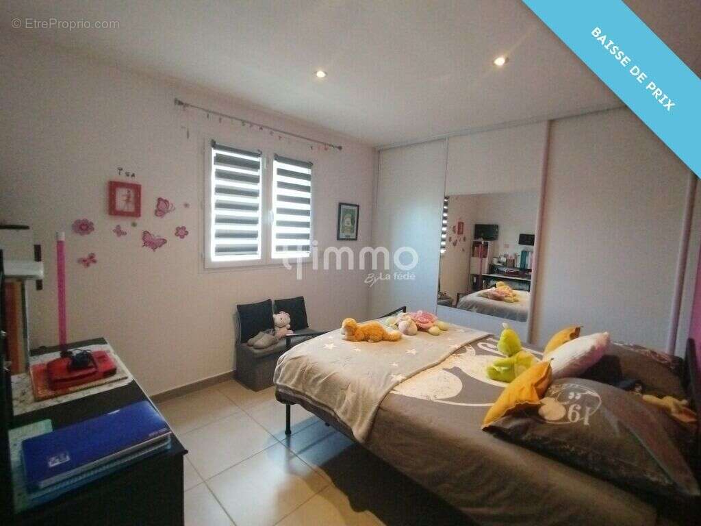 Maison 3 faces - 130 m2 - 5 chambres - Theza - photo 17