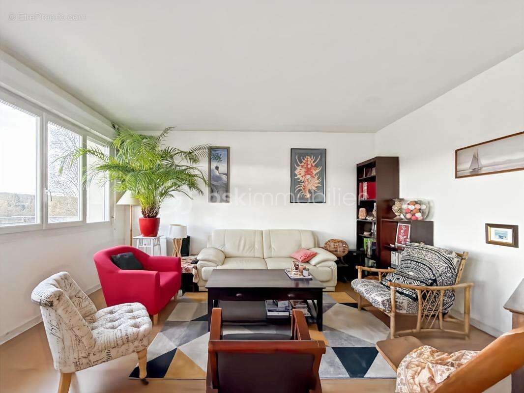Appartement F4 - 75 m2 - 4 chambres - terrasse VUE SEINE - photo 2