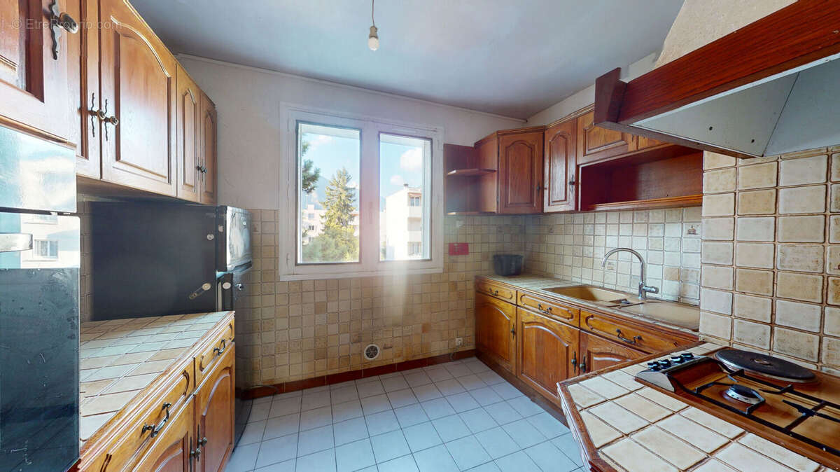 Appartement 3 pièces 53 m2 - Copropriété Ravalée / Isolée - Bajatière / Grenoble / SAINT MARTIN D'HERES - photo 4