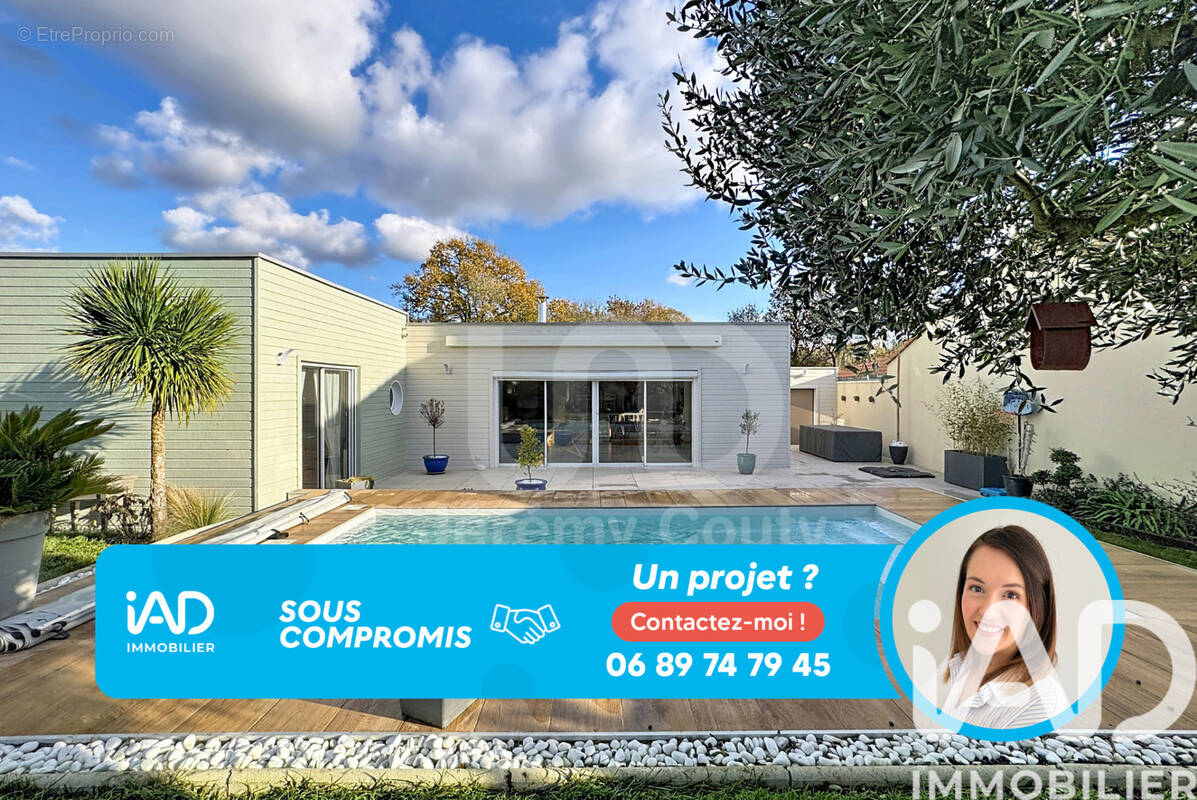 Photo 1 - Maison à BOUGUENAIS