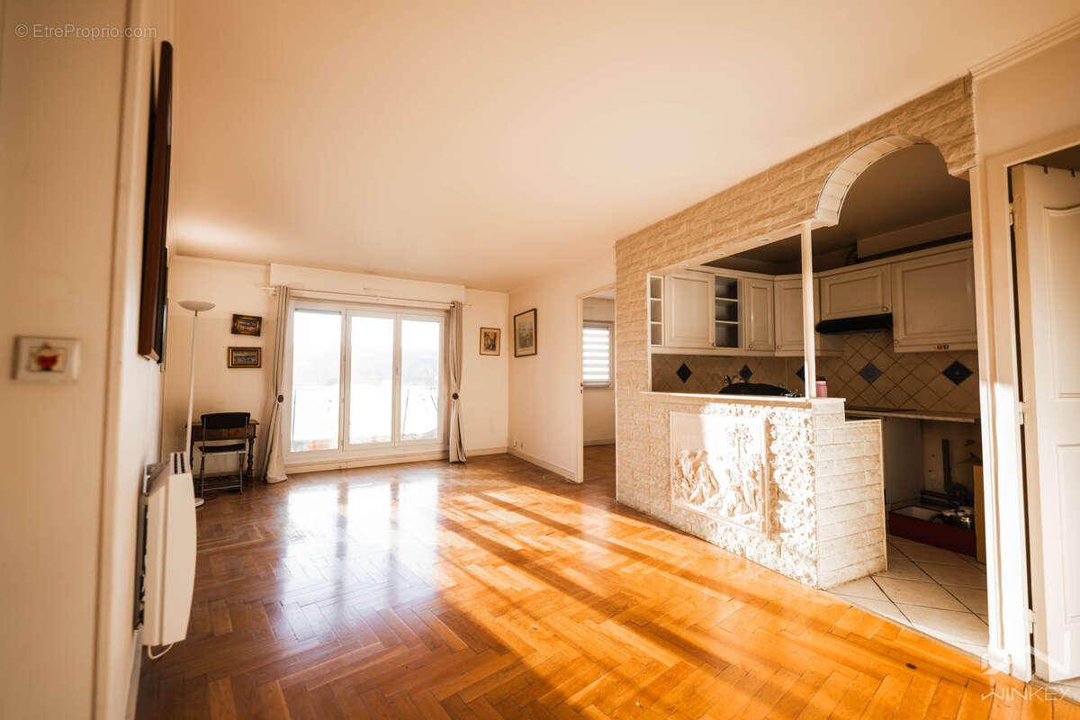Grand 2 pièces de 56 m2 avec bureau, balcon et parking. - photo 2