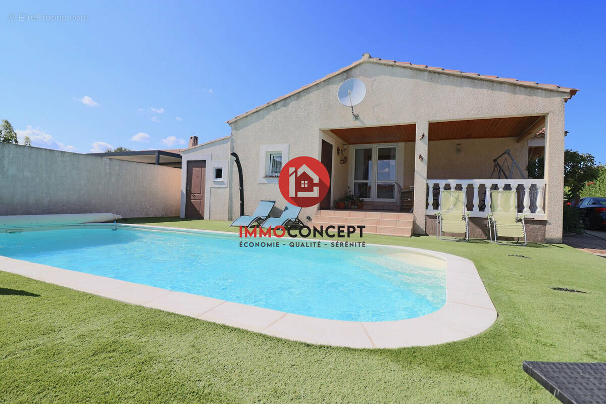 Maison à LAUDUN-L'ARDOISE