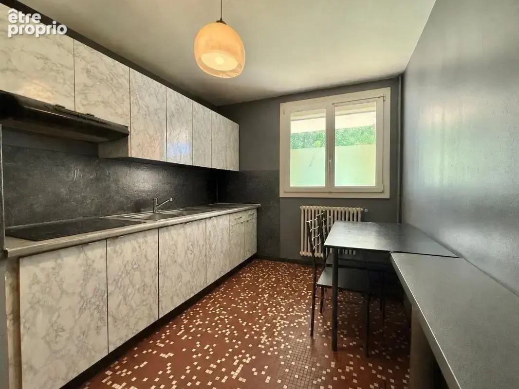 Appartement T4, 3 chambres, en rez-de-chaussée, avec cave en sous-sol - photo 4