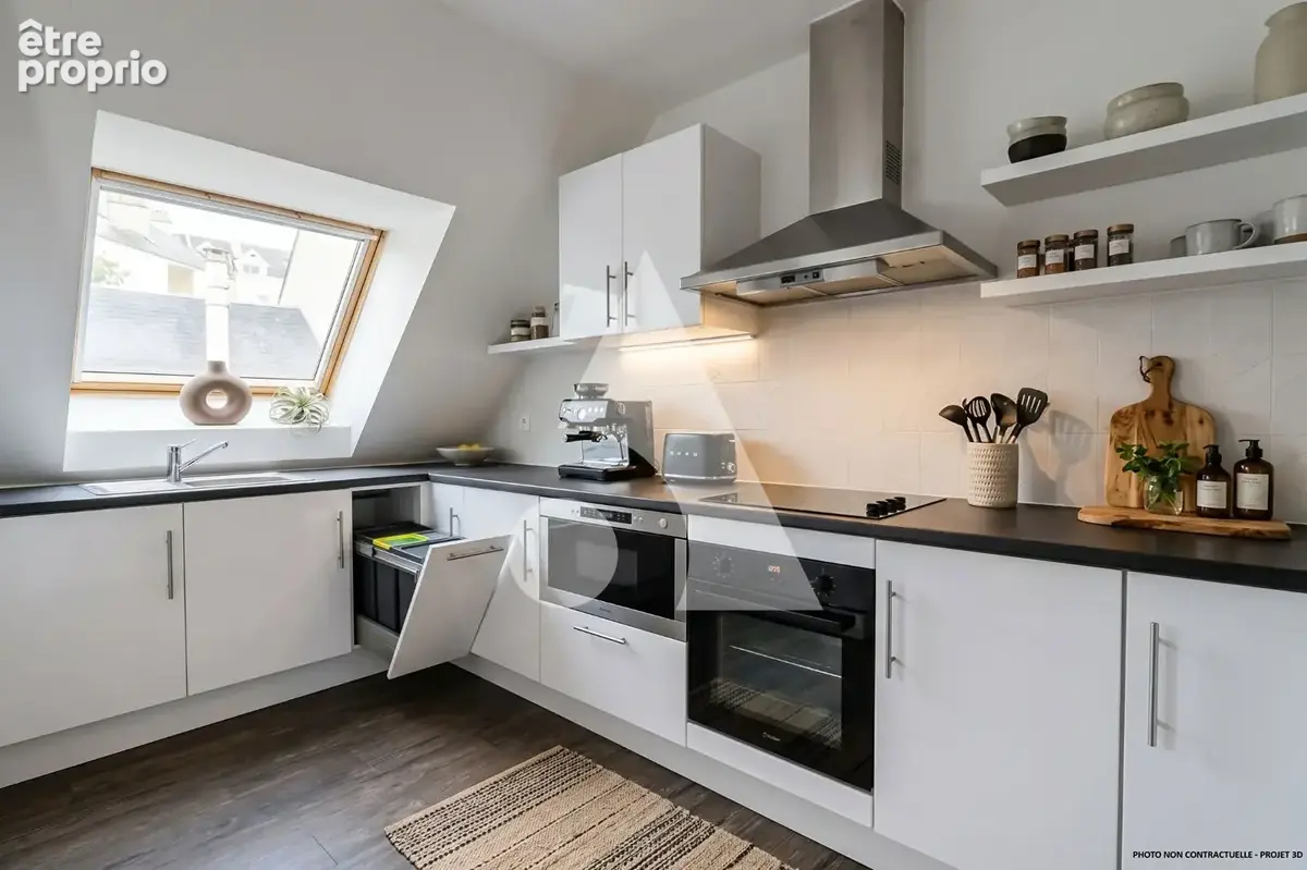 Duplex dernier étage avec extérieur - CENTRE VILLE - photo 3
