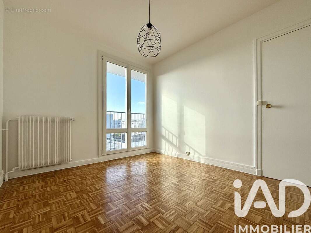 Photo 9 - Appartement à COURBEVOIE