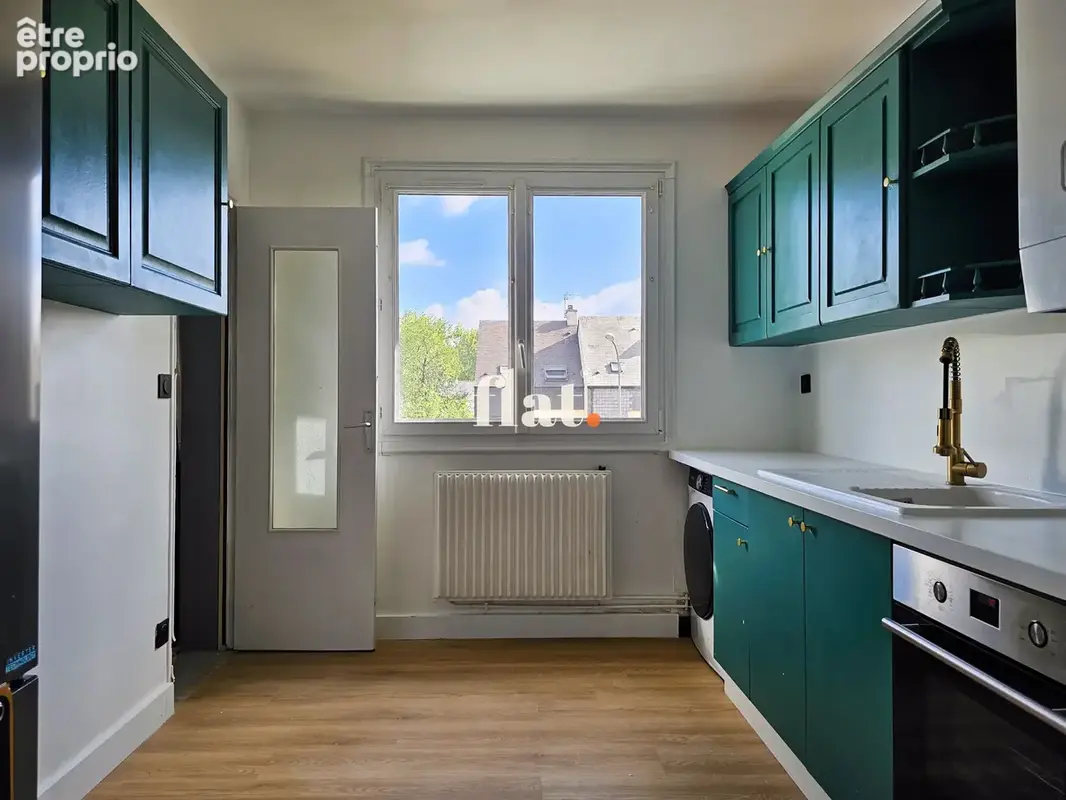Appartement - 72 m2 - t4 (3ch) + parking + cave  - dpe d - photo 3