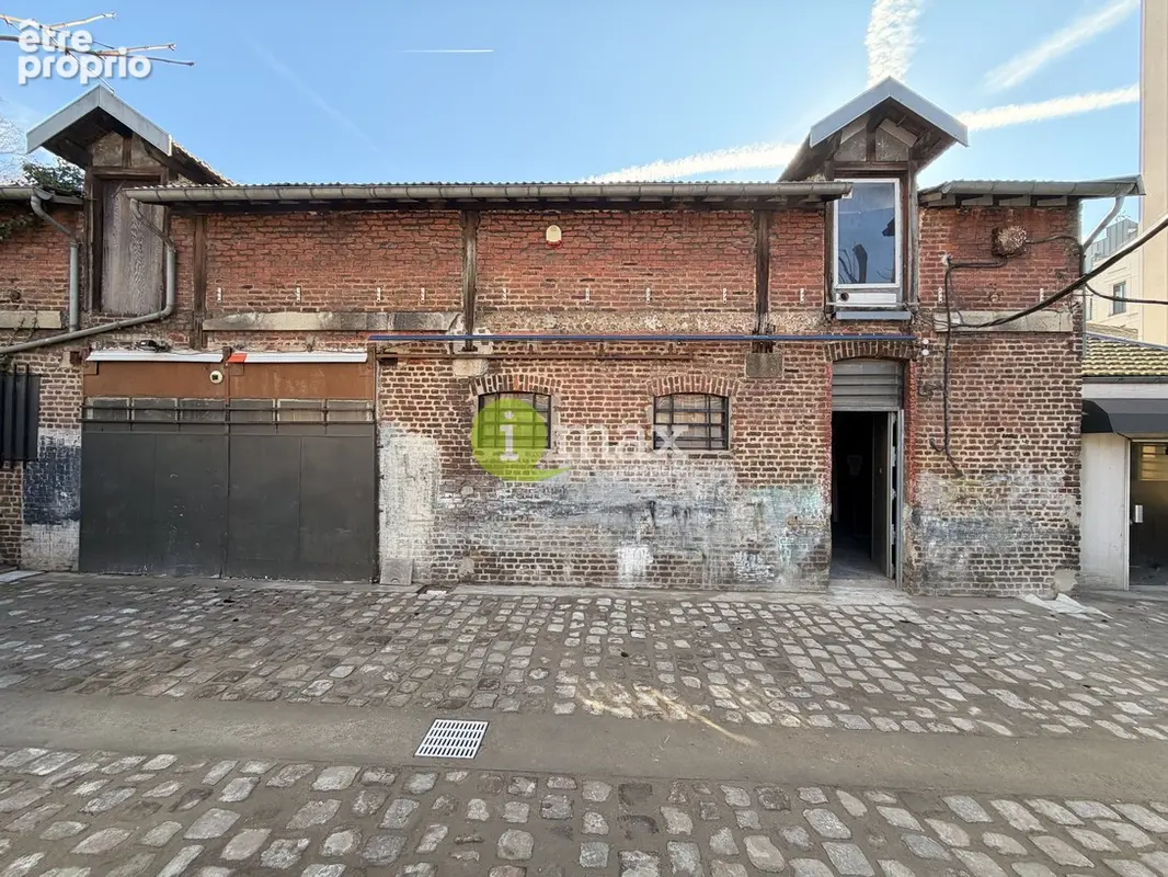 Local d'activité - mairie saint-ouen - 450 000 fai - photo 2