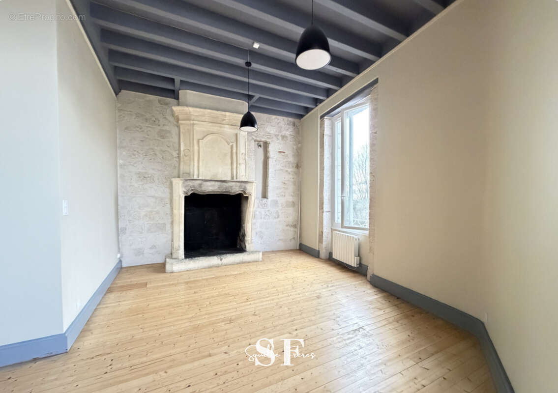 Rive gauche, immeuble de caractere appartement et local commercial - photo 5