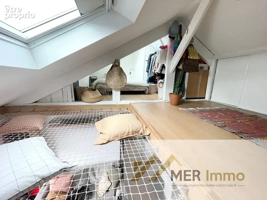 SAINT-MALO PARAMÉ CENTRE- Charmant Appartement T2 en duplex rénové avec goût en plein coeur de Paramé - photo 8