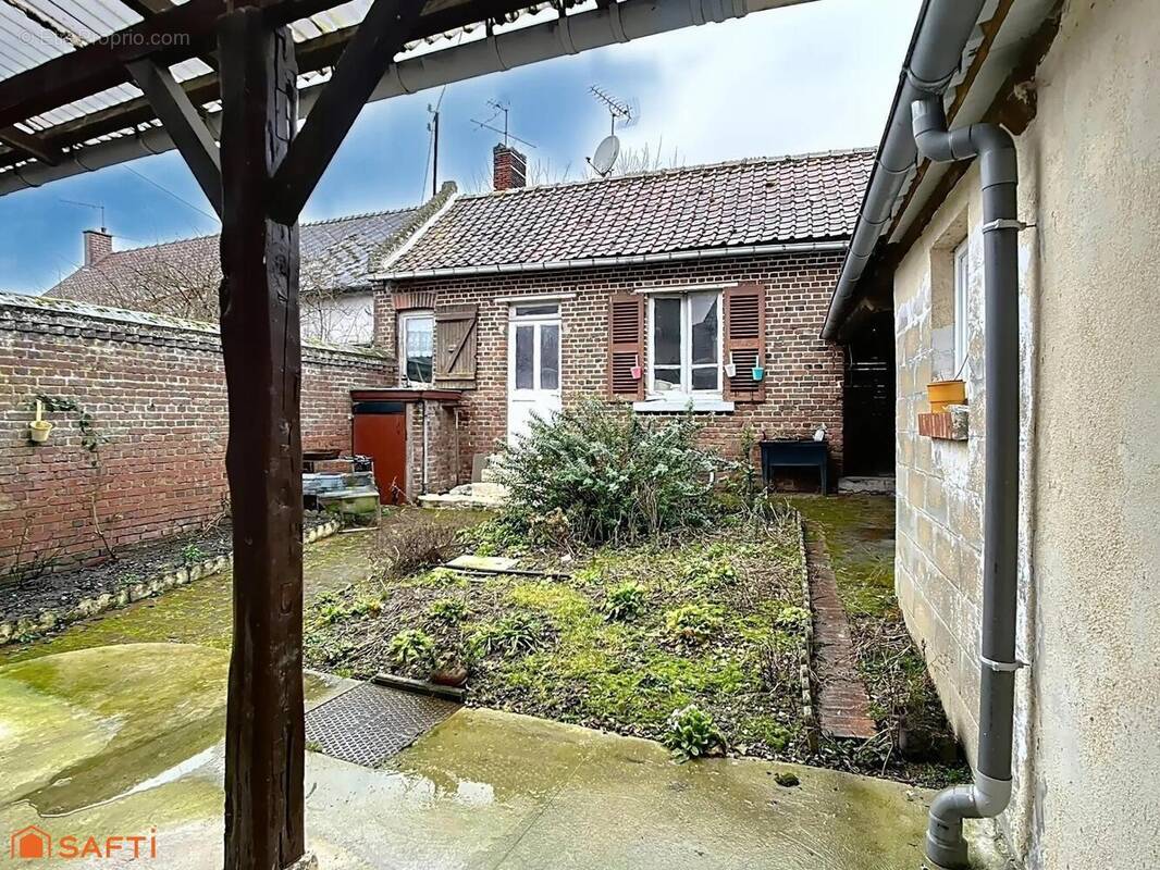 Photo 1 - Maison à BRETEUIL
